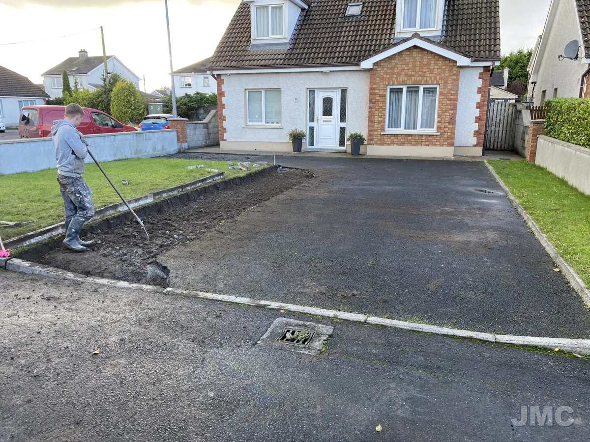 James McCarthy jet washing a tarmac drive
