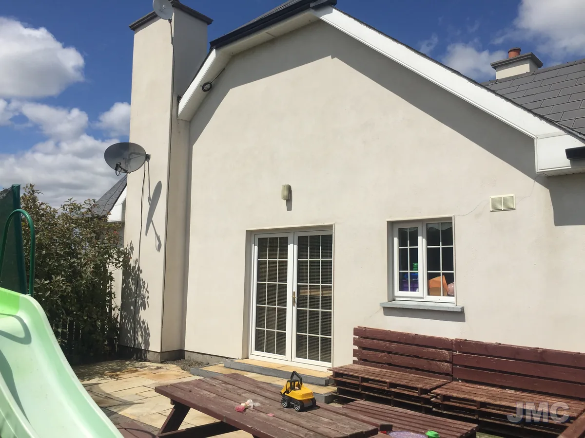After: Render and chimney, staining removed