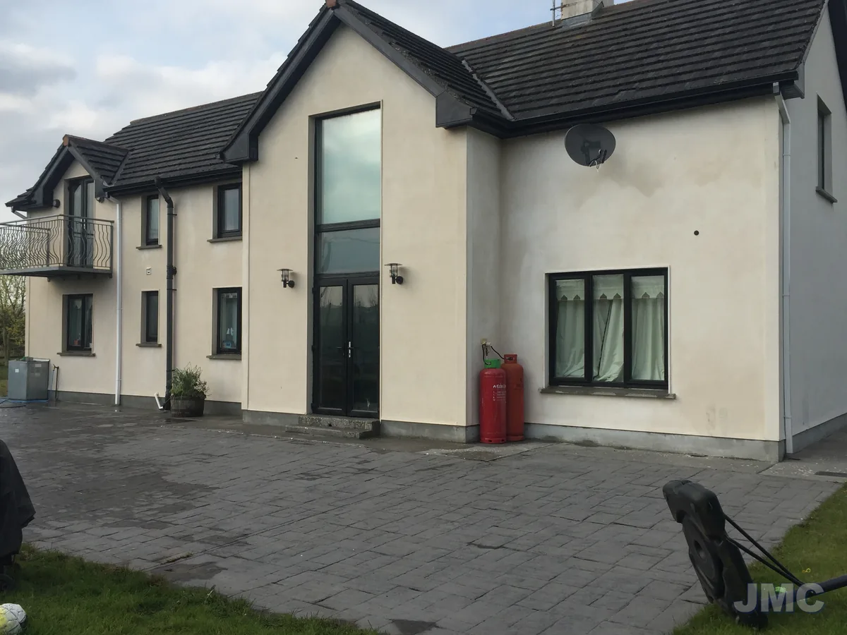 After: Front elevation softwashed