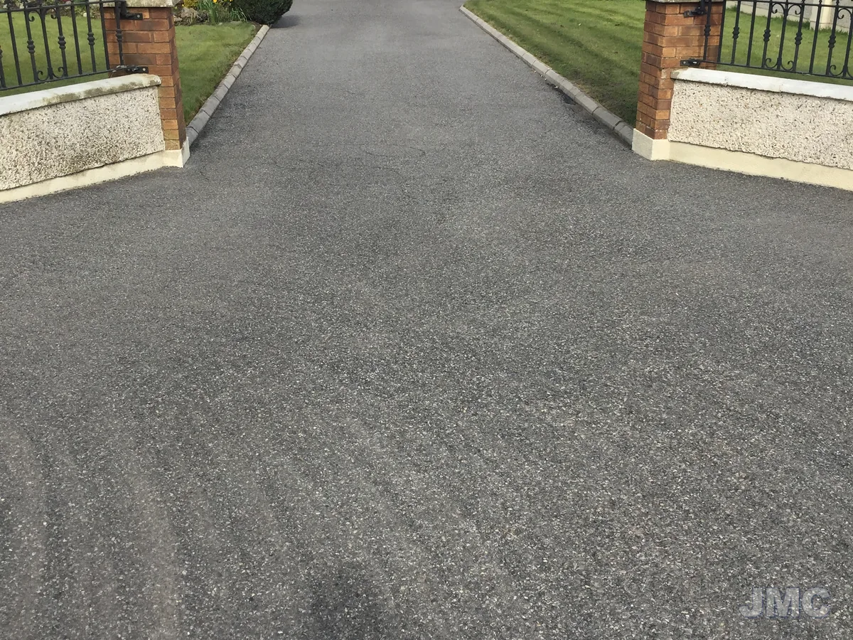 Before: Tarmac drive between the gate piers