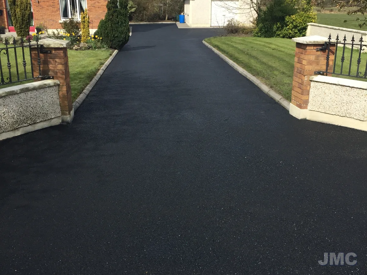 After: Tarmac drive between the gate piers