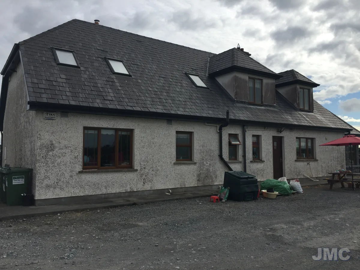 Before: Dormer house, dash cleaned