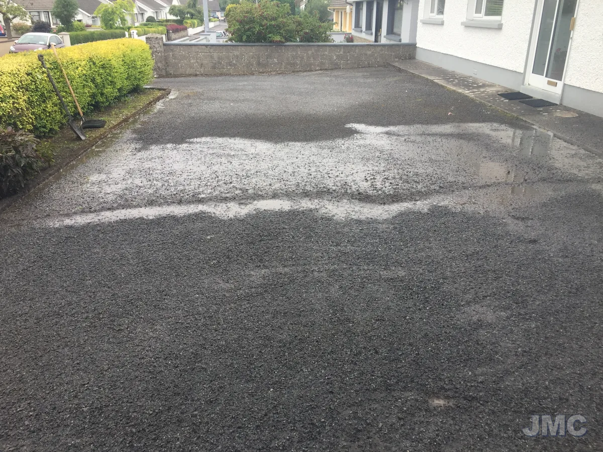 Before: Tarmac forecourt, washed and sealed