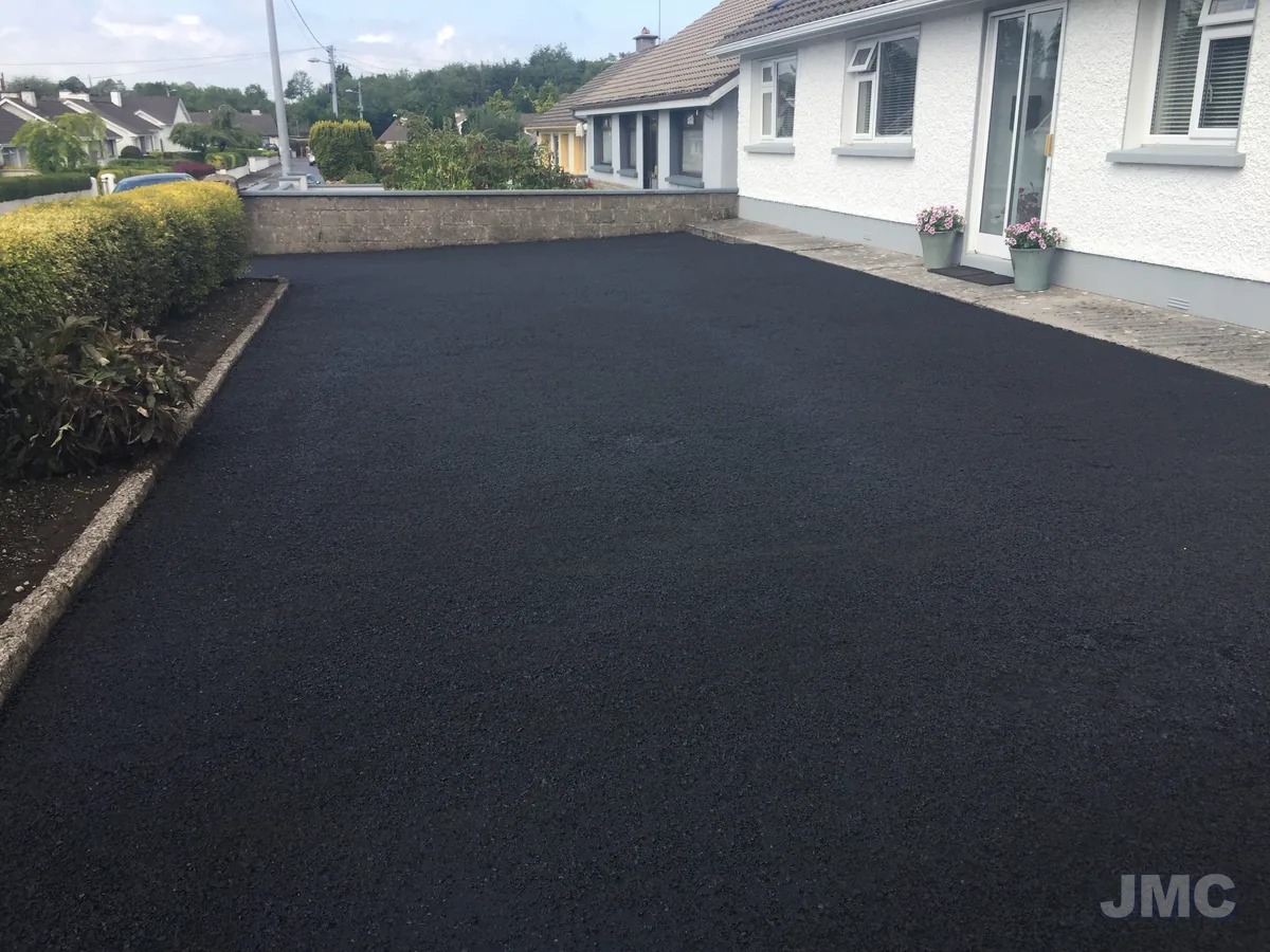 After: Tarmac forecourt, washed and sealed