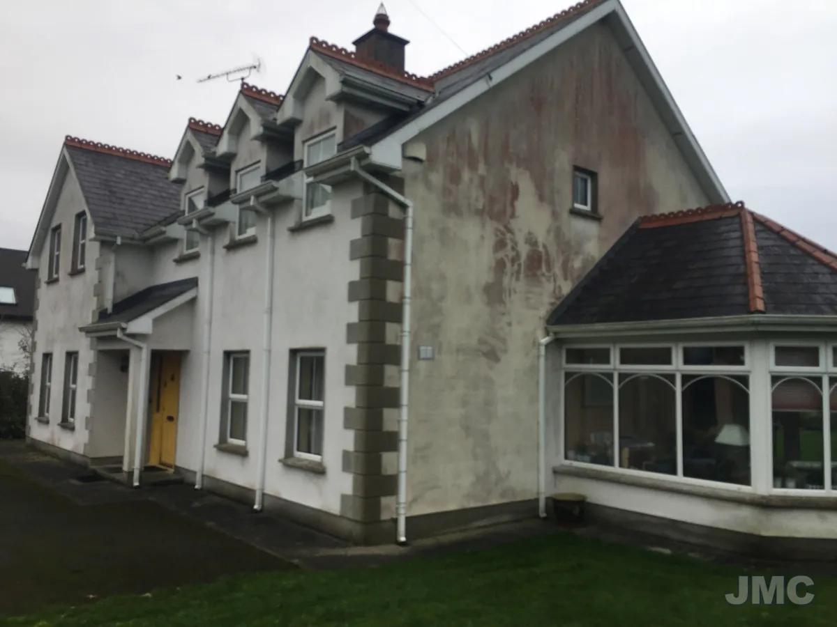Before: Dashed walls and porch cleaned