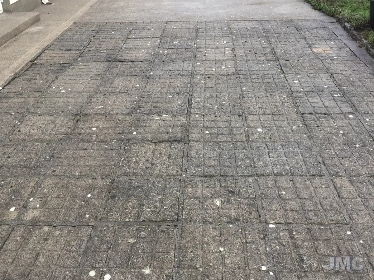 After: Patio slabs, moss and weeds cleared