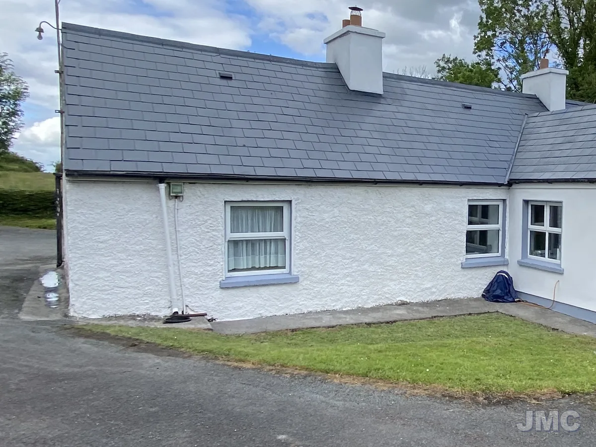 After: Cottage roof cleaned and sealed