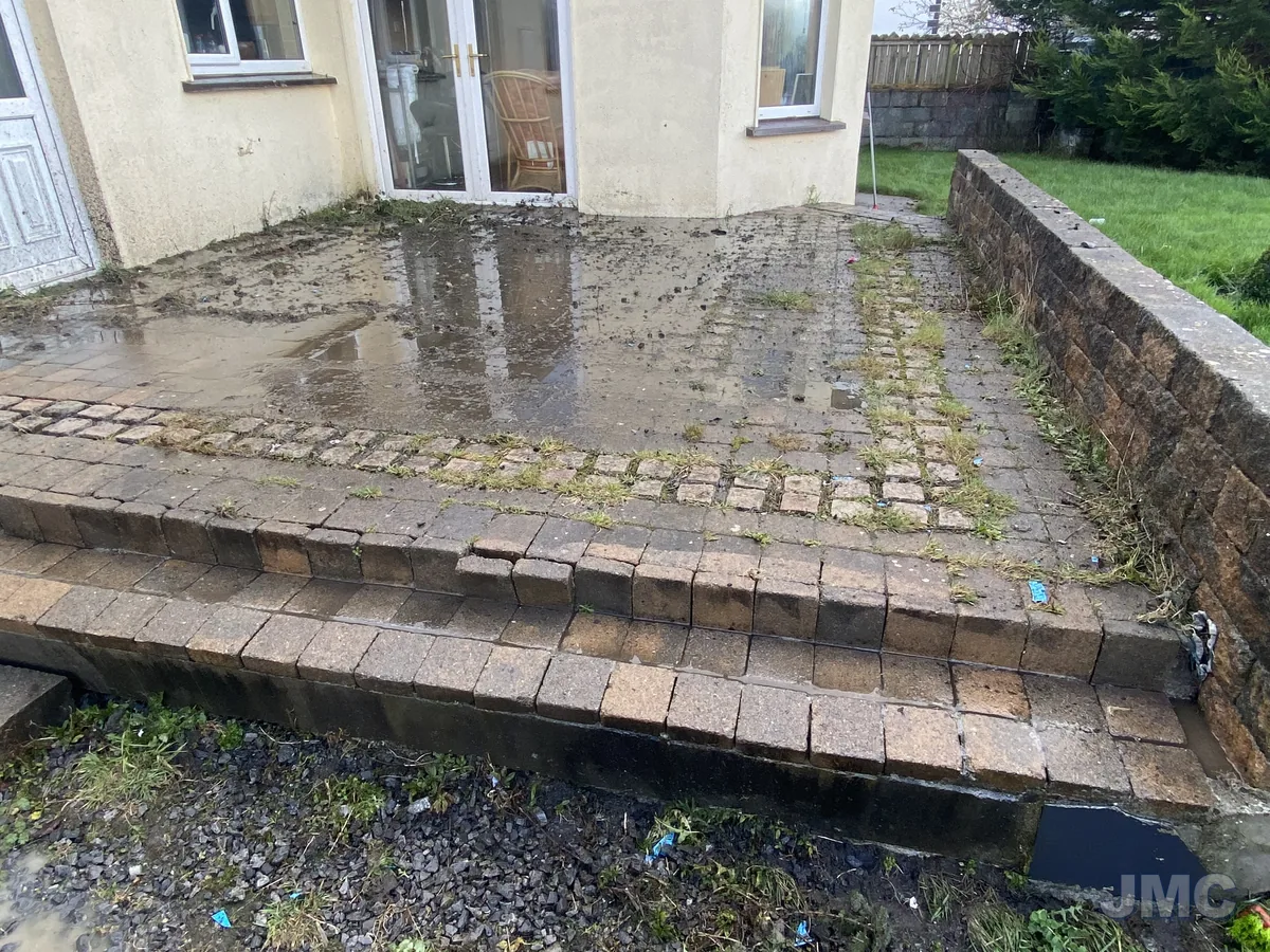 Before: Brick patio and steps washed