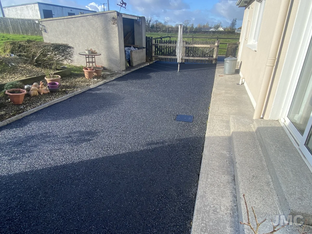 After: Farmyard, washed back to clean tarmac