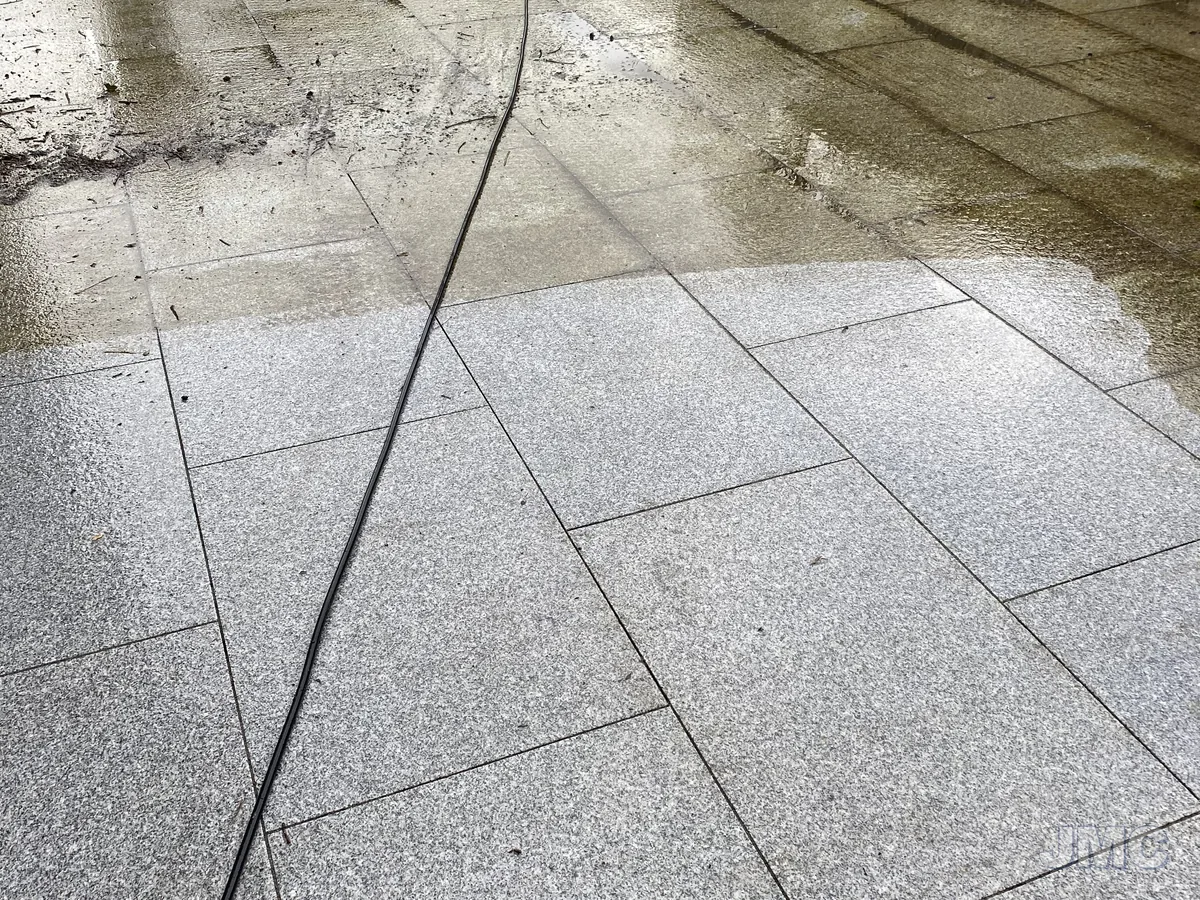 Before: Granite paving washed