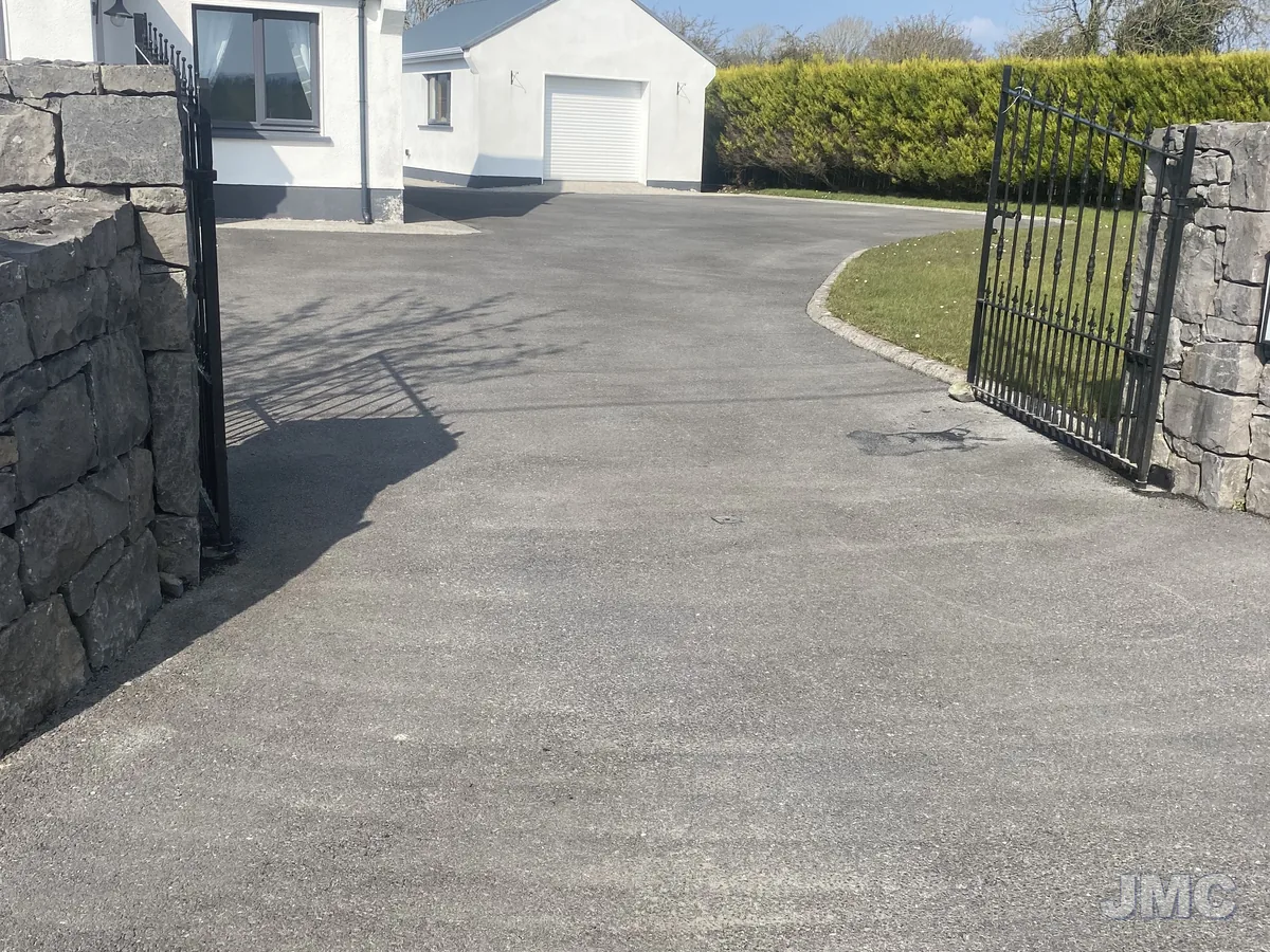 Before: Gravel and tarmac drive, washed