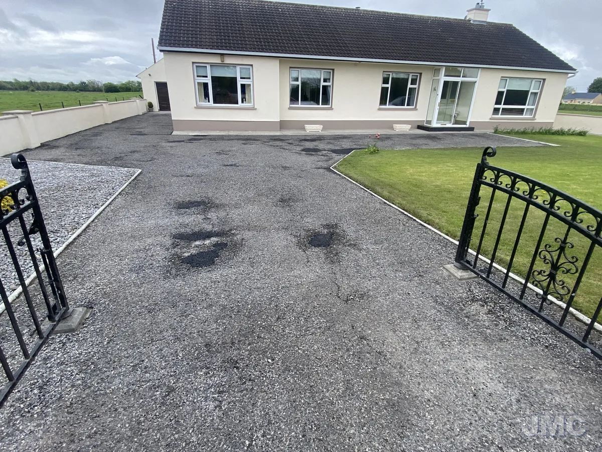 Before: Bungalow drive, oil and moss lifted