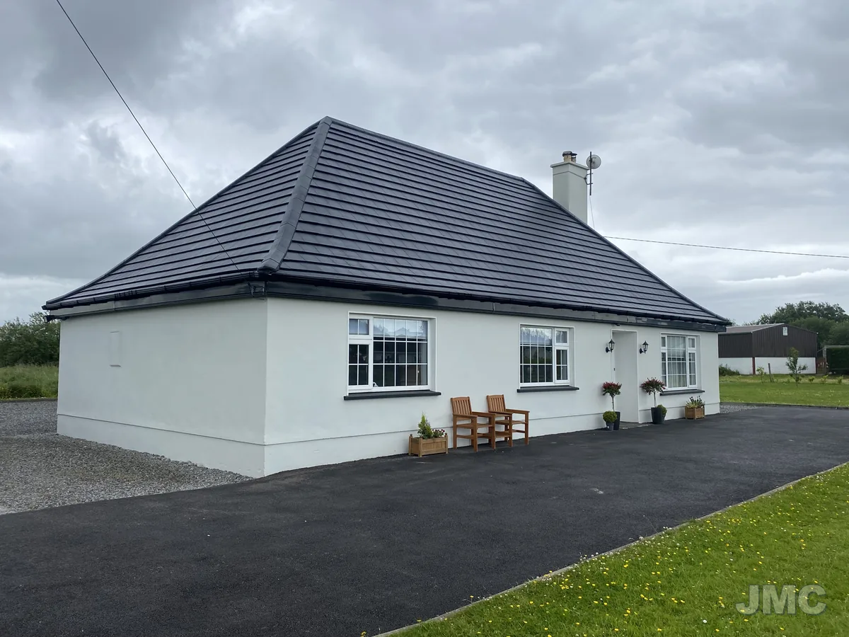After: Hipped roof coated