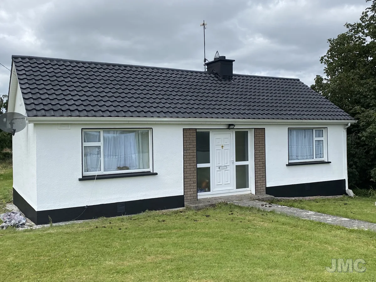 After: Bungalow repainted, roof coated