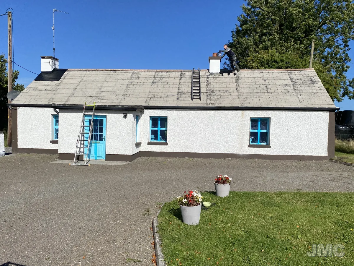 Before: Cottage washed, roof coated and walls repainted