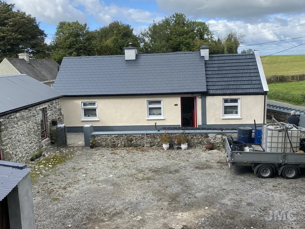 After: Cottage roof sealed