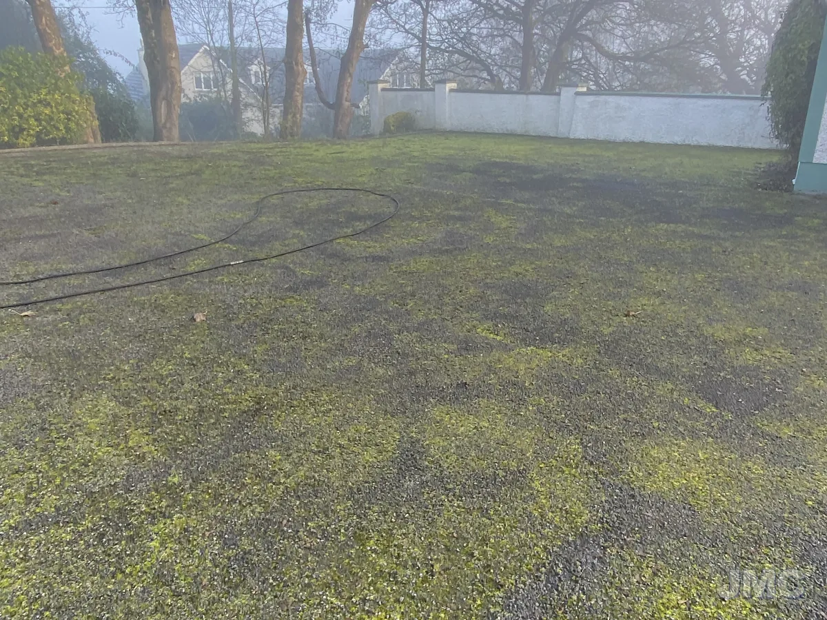 Before: Green tarmac, washed back to black