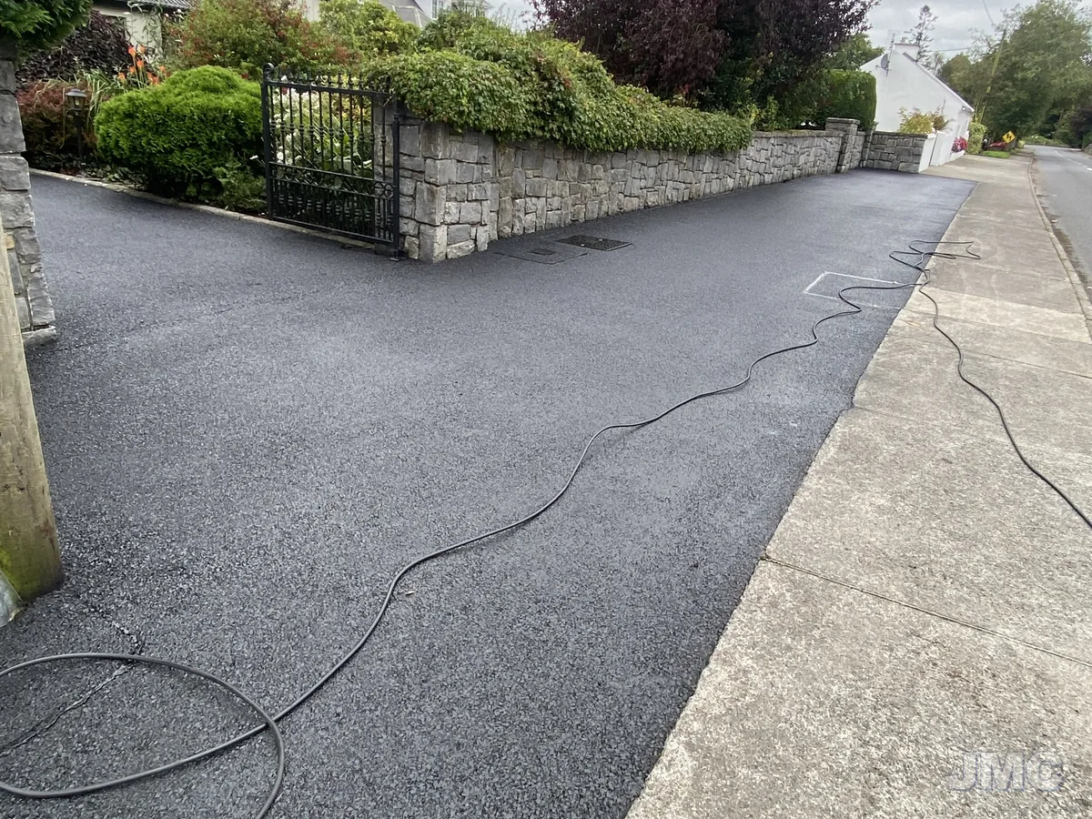 After: Drive and path, leaves and green lifted