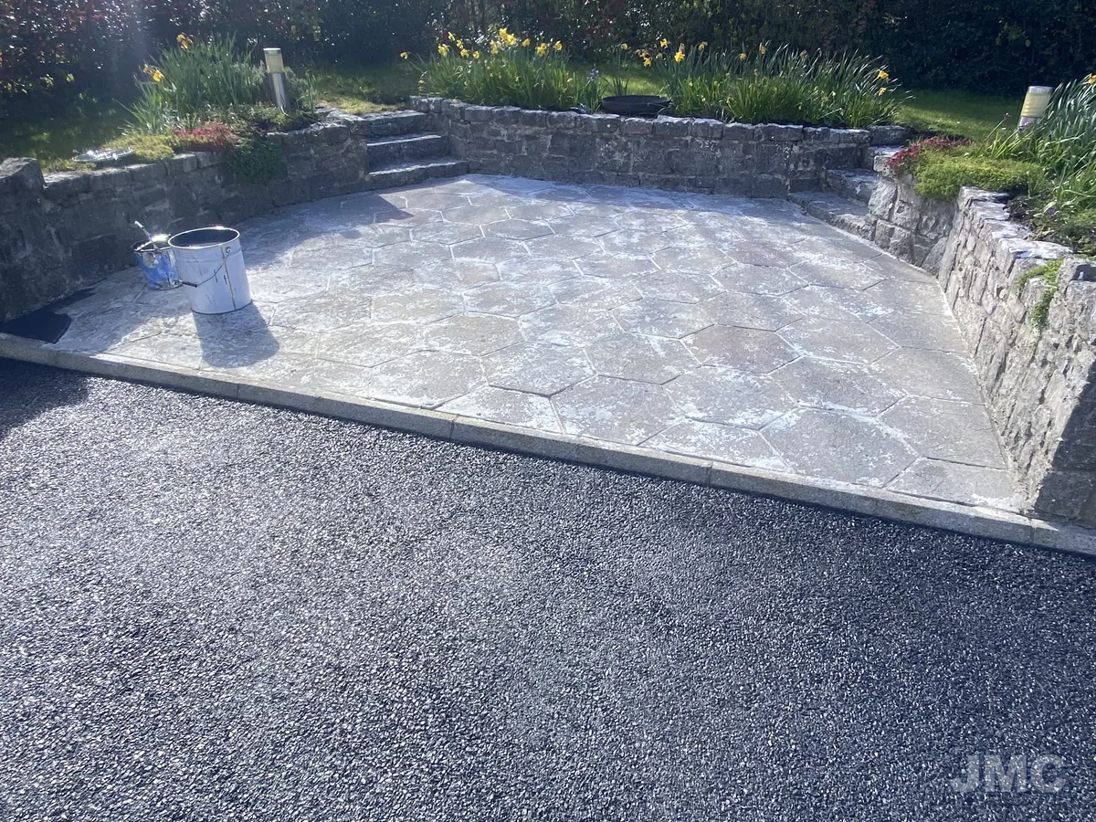 Before: Yard washed and sealed