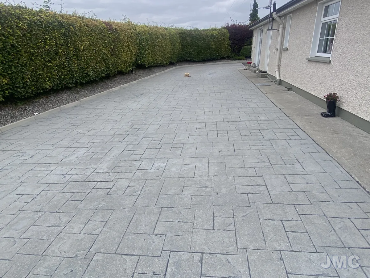 Before: Block paving drive, washed and sealed