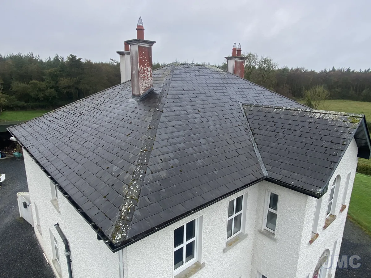 Before: Slate roof cleaned, chimneys washed