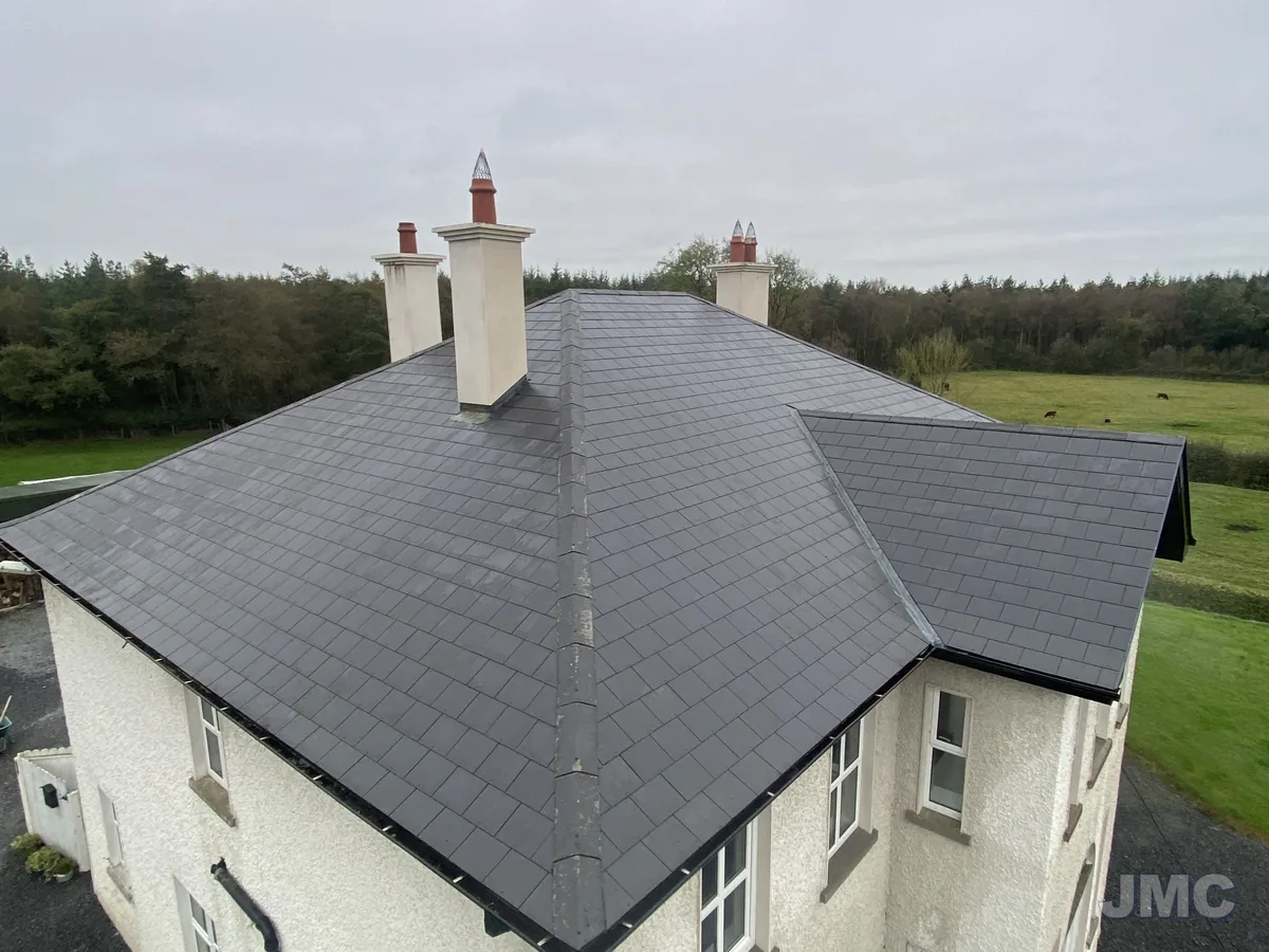 After: Slate roof cleaned, chimneys washed
