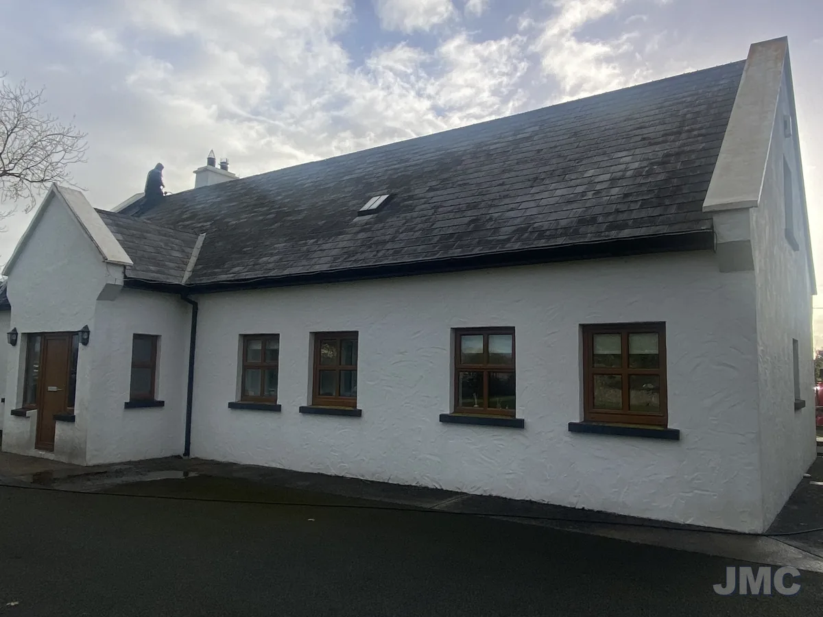 Before: Dormer house, roof and walls washed