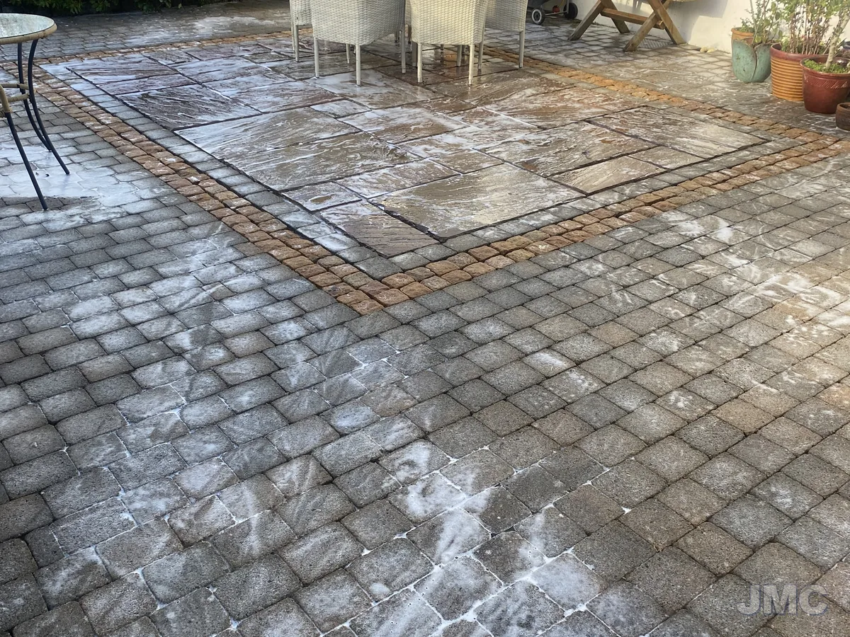 After: Cobble courtyard, moss and staining removed