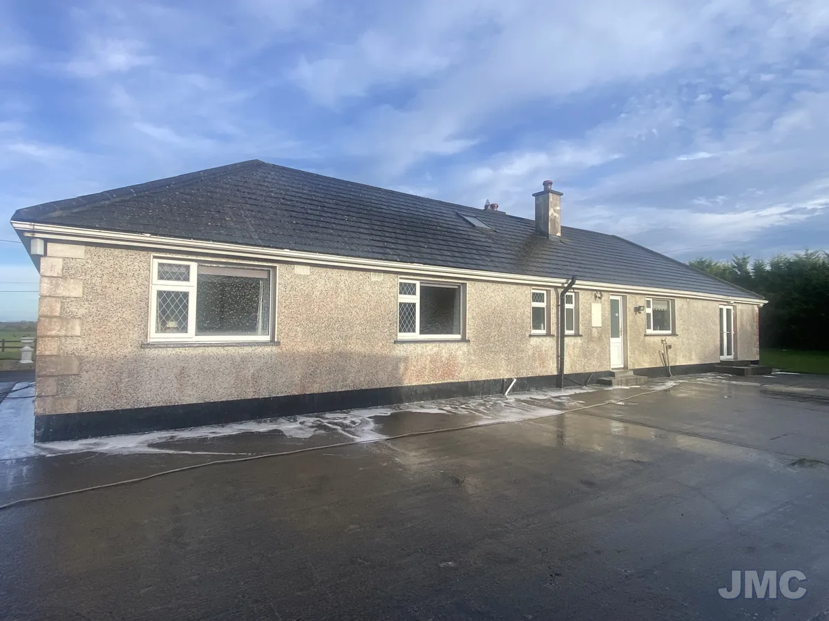 After: Bungalow front, fascia and walls cleaned