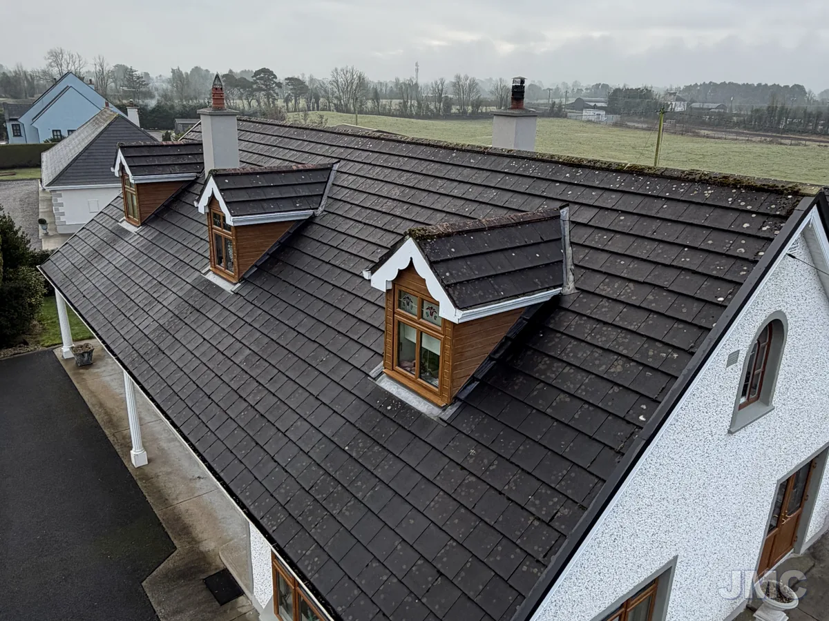 Before: Dormer roof cleaned