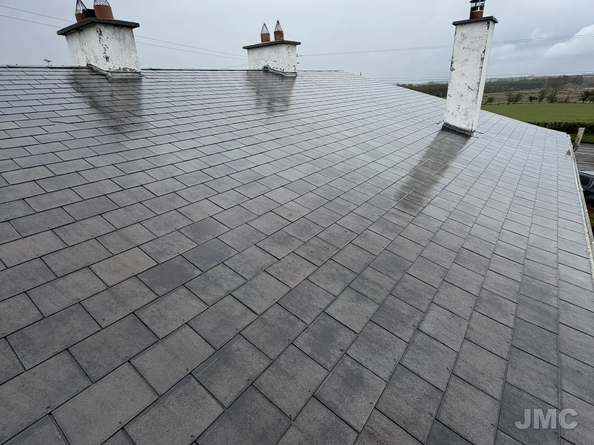 After: Slate roof and chimneys washed