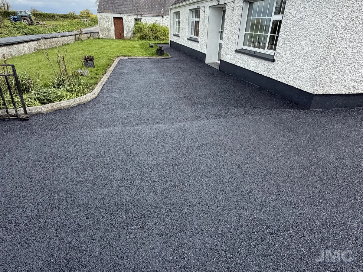 After: Cottage front, tarmac washed