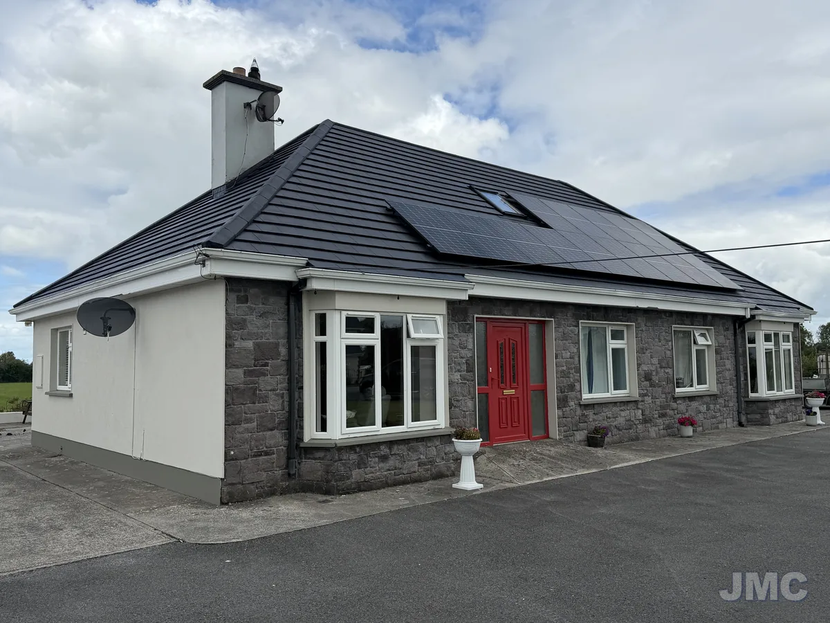 After: Roof coated, panels cleaned