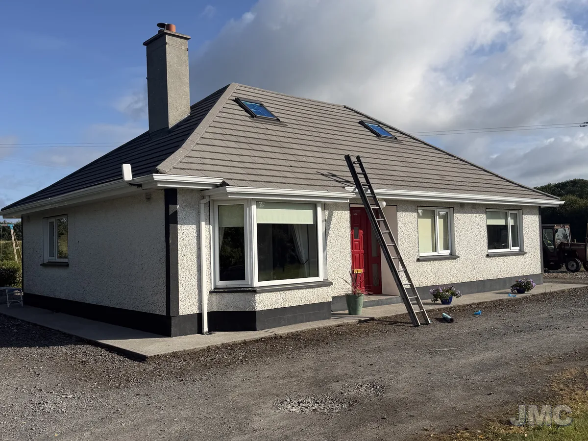 Before: Bungalow, roof coated and walls painted